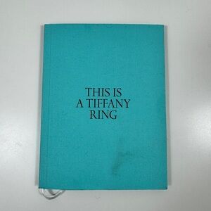 Tiffany & Co. Teal Book with Black Text